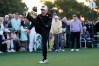 Gary Player kicks his leg in the air after hitting the ceremonial tee shot on the first hole during the first round of the Masters golf tournament at the Augusta National Golf Club, Thursday, April 9, 2026, in Augusta, Ga. (AP Photo/David J. Phillip)