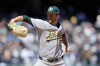 Athletics pitcher Jeffrey Springs throws during the first inning of a baseball game against the New York Yankees, Thursday, April 9, 2026, in New York. (AP Photo/Adam Hunger)