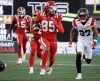 Montreal Alouettes' Wesley Sutton, right, gives chase to Calgary Stampeders' Jalen Philpot during second half CFL football action in Calgary, Thursday, July 24, 2025.THE CANADIAN PRESS/Jeff McIntosh