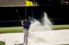 Bryson DeChambeau hits from the bunker on the 11th hole during the first round of the Masters golf tournament at the Augusta National Golf Club, Thursday, April 9, 2026, in Augusta, Ga. (AP Photo/Eric Gay)