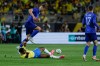 Croatia defender Luka Vuskovic (22) fouls Brazil forward Endrick (19) during the second half of an international friendly soccer game, Tuesday, March 31, 2026, in Orlando, Fla. (AP Photo/Kevin Kolczynski)