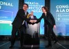 Coalition Avenir Québec leadership candidates Christine Fréchette and Bernard Drainville shake hands following a leadership debate in Laval, Que., Saturday, March 28, 2026. THE CANADIAN PRESS/Graham Hughes