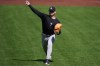 New York Yankees pitcher Cade Winquest warms up before a baseball game against the San Francisco Giants in San Francisco, Saturday, March 28, 2026. (AP Photo/Jeff Chiu)