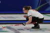 Switzerland's Alina Paetz in action during the women's curling round robin session against Sweden at the 2026 Winter Olympics, in Cortina d'Ampezzo, Italy, Monday, Feb. 16, 2026. (AP Photo/Fatima Shbair)