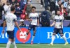Vancouver Whitecaps' Mathias Laborda (2) and Tristan Blackmon (33) celebrate Laborda's goal during the first half of an MLS soccer match against New York City FC, in Vancouver, on Saturday, April 11, 2026. THE CANADIAN PRESS/Darryl Dyck