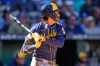 Milwaukee Brewers' Christian Yelich watches his double during the ninth inning of a baseball game against the Kansas City Royals, Sunday, April 5, 2026, in Kansas City, Mo. (AP Photo/Charlie Riedel)