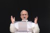 Pope Leo XIV delivers the Regina Coeli prayer in St. Peter's Square at the Vatican, Sunday, April 12, 2026. (AP Photo/Gregorio Borgia)