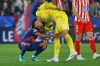 Atletico Madrid's goalkeeper Juan Musso comforts Barcelona's Lamine Yamal after the Champions League quarterfinal first leg soccer match between Barcelona and Atletico Madrid in Barcelona, Spain, Wednesday, April 8, 2026. (AP Photo/Joan Monfort)