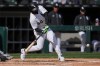 Chicago White Sox's Lenyn Sosa hits an RBI single during the third inning of a baseball game against the Baltimore Orioles, Tuesday, April 7, 2026, in Chicago. (AP Photo/Erin Hooley)