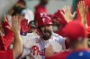 Philadelphia Phillies' Kyle Schwarber celebrates after his two-run home run off Chicago Cubs pitcher Javier Assad during the third inning of a baseball game, Monday, April 13, 2026, in Philadelphia. (AP Photo/Matt Rourke)