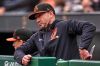 Baltimore Orioles manager Craig Albernaz looks out from the dugout during the second inning of a baseball game against the Pittsburgh Pirates in Pittsburgh, Sunday, April 5, 2026. (AP Photo/Gene J. Puskar)