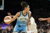 Chicago Sky guard Kia Nurse dribbles the ball against the Phoenix Mercury during the second half of a WNBA basketball game Thursday, Aug. 28, 2025, in Phoenix. (AP Photo/Ross D. Franklin)