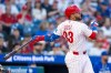 Philadelphia Phillies' Edmundo Sosa hits a three-run home run during the second inning of a baseball game against the Chicago Cubs, Tuesday, April 14, 2026, in Philadelphia. (AP Photo/Chris Szagola)