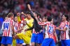 Atletico Madrid's players celebrate at the end of the Champions League quarterfinal second leg soccer match between Atletico Madrid and Barcelona in Madrid, Spain, Tuesday, April 14, 2026. (AP Photo/Manu Fernandez)