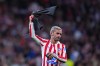Atletico Madrid's Antoine Griezmann celebrates at the end of the Champions League quarterfinal second leg soccer match between Atletico Madrid and Barcelona in Madrid, Spain, Tuesday, April 14, 2026. (AP Photo/Manu Fernandez)