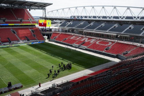 Media are seen on the pitch of BMO Field during a tour organized by MLSE and the City of Toronto to showcase the stadium’s upgrades ahead of hosting six FIFA World Cup 2026 matches in Toronto, Ont., March 24, 2026. THE CANADIAN PRESS/Eduardo Lima