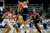 Notre Dame guard Dara Mabrey (1) puts up a shot against North Carolina State guard Kai Crutchfield, left, and guard Diamond Johnson (0) during the second quarter of a college basketball game in the Sweet Sixteen round of the NCAA women's tournament, Saturday, March 26, 2022, in Bridgeport, Conn. (AP Photo/Frank Franklin II)