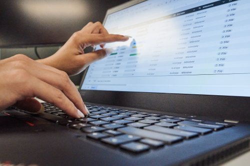 A person works on a spreadsheet in a photo illustration made in Toronto, on Monday, Sept. 22, 2025. THE CANADIAN PRESS/Sammy Kogan
