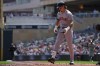 Boston Red Sox's Jarren Duran walks back to the dugout after striking out during the first inning of a baseball game against the Minnesota Twins Wednesday, April 15, 2026, in Minneapolis. (AP Photo/Abbie Parr)