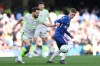 Manchester City's Bernardo Silva, left, and Chelsea's Cole Palmer fight for the ball during the Premier League soccer match between Chelsea and Manchester City in London, Sunday, April 12, 2026. (AP Photo/Ian Walton)