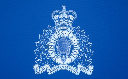 An RCMP logo is seen at a news conference, in St. John's, N.L., Saturday, June 24, 2023. THE CANADIAN PRESS/Adrian Wyld