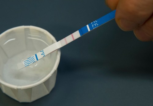 A fentanyl test strip is used at Vancouver Coastal Health in Vancouver, Tuesday, January, 21, 2020. THE CANADIAN PRESS/Jonathan Hayward