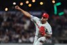 Philadelphia Phillies pitcher Jhoan Duran throws during the ninth inning of a baseball game against the San Francisco Giants in San Francisco, Monday, April 6, 2026. (AP Photo/Jed Jacobsohn)