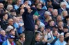 Manchester City's head coach Pep Guardiola gestures during the English Premier League soccer match between Manchester City and and Arsenal, in Manchester, England, Sunday, April 19, 2026. (AP Photo/Dave Thompson)