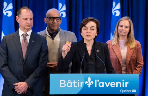 Quebec Premier Christine Fréchette is flanked by, from left to right, Quebec Finance Minister Eric Girard, Quebec Minister of International Relations and La Francophonie Christopher Skeete and Valérie Schmaltz, member of the legislature for Vimont, as she makes an announcement in Laval, Que., on Friday, April 17, 2026. THE CANADIAN PRESS/Christinne Muschi