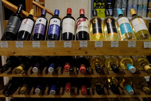 Bottles of British Columbia wine are displayed at a liquor store in Cremona, Alta., on Feb. 7, 2018. THE CANADIAN PRESS/Jeff McIntosh