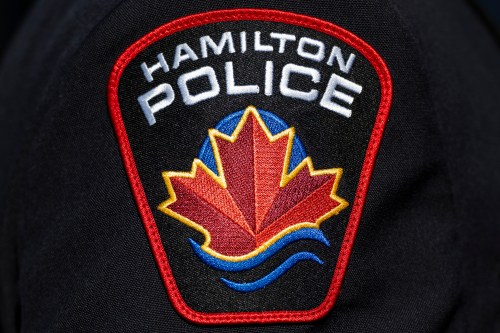 A Hamilton Police Service logo is seen in Ottawa, on Sunday, Sept. 28, 2025. THE CANADIAN PRESS/Spencer Colby