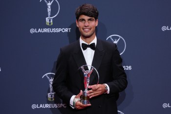Carlos Alcaraz poses with his Laureus World Sportsman of the Year award during the 2026 Laureus World Sports Awards ceremony in Madrid, Spain, Monday, April 20, 2026. (AP Photo/Manu Fernandez)