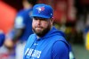 Toronto Blue Jays manager John Schneider pauses in the team dugout prior to a baseball game against the Arizona Diamondbacks, Saturday, April 18, 2026, in Phoenix. (AP Photo/Ross D. Franklin)