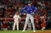 Toronto Blue Jays relief pitcher Jeff Hoffman (23) reacts after striking out the last Los Angeles Angels batter to win the game at the end of the ninth inning of a baseball game Monday, April 20, 2026, in Anaheim, Calif. (AP Photo/Caroline Brehman)