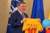 FILE - Former Romanian soccer star Gheorghe Hagi holds an autographed t-shirt after receiving the Star of Romania award, in Bucharest, Romania, on March. 12, 2025. (AP Photo/Andreea Alexandru, File)