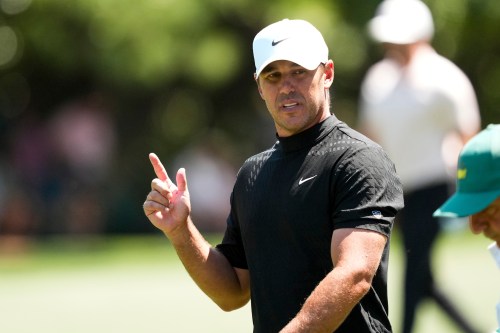 Brooks Koepka walks to green on the first hole during the final round of the Masters golf tournament at the Augusta National Golf Club, Sunday, April 12, 2026, in Augusta, Ga. (AP Photo/Matt Slocum)