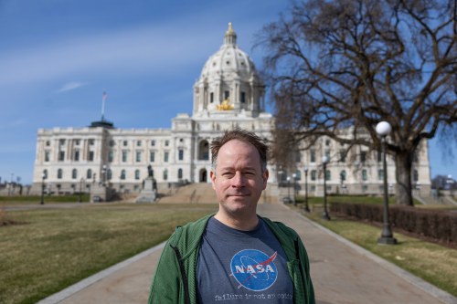 Colin Lee, founder of the Civic Loon app, poses for a portrait outside the Minnesota State Capitol, Tuesday, April 7, 2026, in St. Paul, Minn. (Ellen Schmidt/MinnPost/CatchLight Local/Report for America via AP)