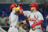 St. Louis Cardinals' Nathan Church, right, celebrates with Masyn Winn, after hitting a two-run home run to bring them both home during the fourth inning of a baseball game against the Miami Marlins, Tuesday, April 21, 2026, in Miami. (AP Photo/Rebecca Blackwell)