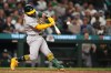 Athletics' Shea Langeliers hits a solo home run against the Seattle Mariners during the sixth inning of a baseball game, Monday, April 20, 2026, in Seattle. (AP Photo/Lindsey Wasson)