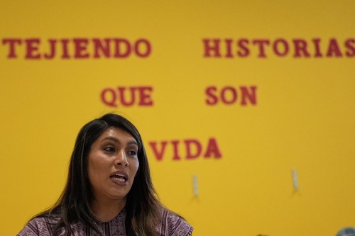 Muxe artist Xaneri Merino gives a backstrap loom workshop for LGBTQ+ people in Mexico City, Tuesday, April 14, 2026. (AP Photo/Marco Ugarte)