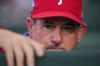 Philadelphia Phillies manager Rob Thomson stands in the dugout before a baseball game against the Chicago Cubs, Tuesday, April 21, 2026, in Chicago. (AP Photo/Erin Hooley)