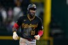 Pittsburgh Pirates' Oneil Cruz celebrates his three-run home run in the ninth inning of a baseball game against the Texas Rangers Wednesday, April 22, 2026, in Arlington, Texas. (AP Photo/Tony Gutierrez)
