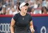 Bianca Andreescu, of Canada, reacts during her first round match against Barbora Krejcikova, of the Czech Republic, at the National Bank Open tennis tournament in Montreal, Sunday, July 27, 2025. THE CANADIAN PRESS/Graham Hughes