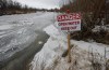 Sandbagging efforts are complete in Peguis First Nation, Man., and now community members are playing a waiting game to see if the nearby Fisher River causes extensive flooding. The Fisher River that runs through Peguis First Nation, Man., is shown on Thursday, April 16, 2026. THE CANADIAN PRESS/John Woods