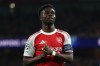 FILE - Arsenal's Bukayo Saka reacts during the second leg of the Champions League round of 16 soccer match between Arsenal and Bayer Leverkusen, in London, Tuesday, March 17, 2026. (AP Photo/Ian Walton, file)