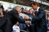 FILE - Tottenham Hotspur's manager Andre Villas-Boas, right, shakes-hand with Chelsea's manager Jose Mourinho before the start of their English Premier League soccer match at White Hart Lane, London, Sept. 28, 2013. (AP Photo/Sang Tan, File)