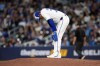 Blue Jays pitcher Jeff Hoffman (23) reacts after giving up a solo homer to the Athletics during a Major League Baseball game in Toronto on March 27, 2026. THE CANADIAN PRESS/Nathan Denette