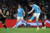 Napoli's Scott McTominay scores a goal during the Serie A soccer match between Napoli and Cremonese, Friday, April 24 , 2026, in Naples, Italy. (Alessandro Garofalo/LaPresse via AP)