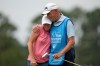 Stacy Lewis gets a hug from her caddie and father Dale on the 18th hole after the second round of the Chevron Championship LPGA golf tournament Friday, April 24, 2026, in Houston. (AP Photo/Ashley Landis)
