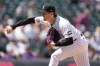 Colorado Rockies starting pitcher Ryan Feltner works against the San Diego Padres in the first inning of a baseball game Thursday, April 23, 2026, in Denver. (AP Photo/David Zalubowski)